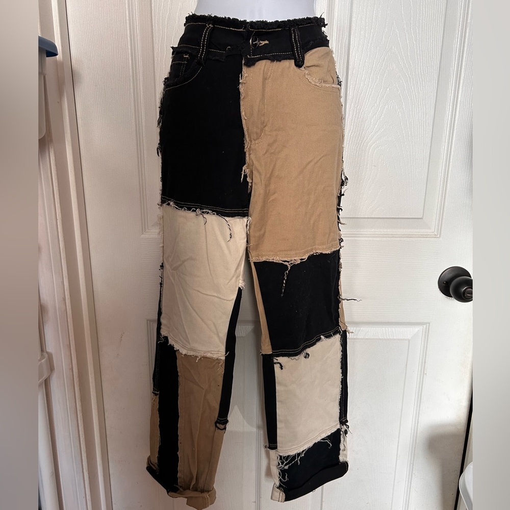 Jeans size small tan/cream/black patched